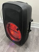 Full view of ION Total PA Glow 2 speaker with red LED ring lit