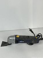 Full view of Mastercraft oscillating tool with blade and cord