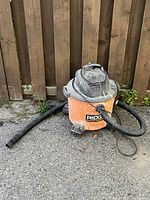 Full view of Ridgid shop vac with hose