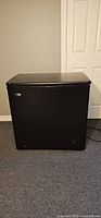 Front view of closed black Danby chest freezer