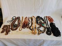Full layout of twelve boho necklaces