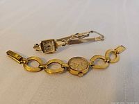 Both watches overview on white surface