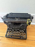 Front view of Underwood manual typewriter showing keyboard and carriage