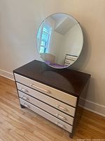 front view of dresser with mirror