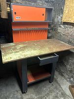 Full view of Hirsh steel workbench with cabinet, pegboard, drawer and shelf