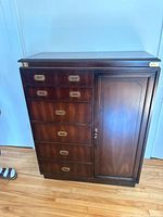 Front view showing drawer and cabinet arrangement, hardware, overall condition