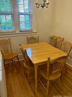 Table with six chairs in nook