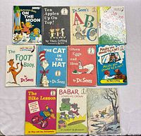 Group shot of all 11 children’s books laid out in rows