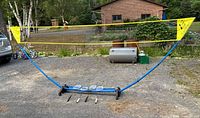 Assembled badminton net with base set up outdoors