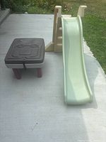 Slide and sand table on patio