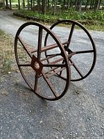 Full view of steel spool showing both rims and crossbars