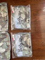 Two sealed Thirty-One small camo packing cubes in original packaging