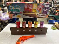 Full set with box, base, five cans, gun