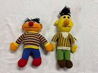 Front view of Bert and Ernie plush dolls