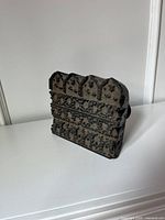 front view showing carved pattern