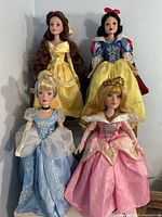 Group shot of four Disney Princess dolls