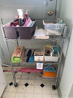 Full view of 3-tier rolling wire shelf with all items in place