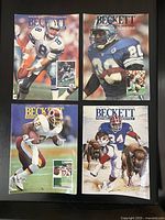 Front view of four Beckett Football Card Monthly magazines in 2x2 layout
