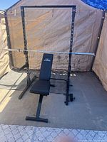 Overall view of rack, bench and barbell