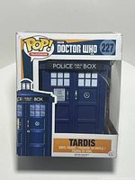Front view of Funko Pop TARDIS in original box showing series and number