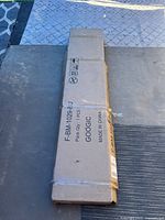 Sealed cardboard shipping box labeled GOOGIC locker cabinet