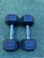 Top view of both 25-lb dumbbells