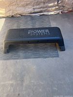 Top view showing Power Systems branding and textured surface