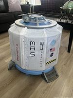 Side view of cylindrical Mars Habitat playset showing door, graphics and ramps