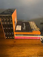 Group showing Calvin and Hobbes set, stack of five additional books