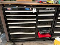Front view of Craftsman rolling toolbox showing drawers, lock, key, and size