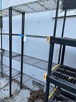 Both shelving units side by side showing overall form and condition