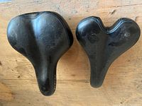Top view of both CCM bicycle seats, wide and narrow