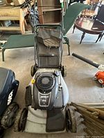Full view of Yardpro push mower showing deck, handle, wheels