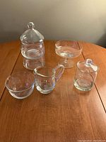 Group view of all five crystal pieces showing overall design and lids