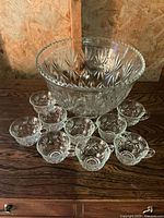 whole punch bowl with 11 cups displayed
