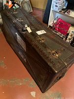 Overall view of trunk showing lid, hardware and wear