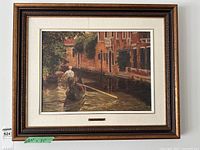 Front view of framed art print showing entire piece with frame and size tape