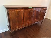 Front view of inlaid mahogany buffet cabinet