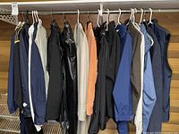 Full rack of assorted jackets and suits