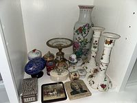 Shelf contents showing all decorative pieces grouped