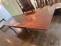 view of full table top with leaf inserted