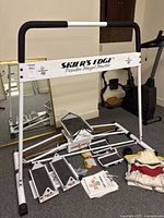 Overall view of Skier’s Edge Powder Mogul Master assembled with accessories on floor