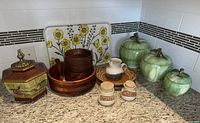 Group shot of all kitchen storage and serveware items on countertop