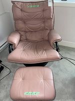 Full view of leather chair and ottoman