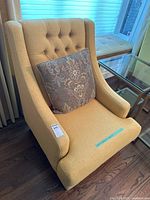 front angled view of lounge chair and pillow