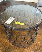 Top view showing circular glass surface and price tag