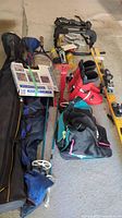 Overview of all sporting goods on garage floor