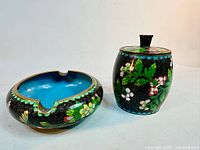 Ashtray and lidded jar side by side showing overall design