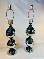 Front view of both matching stacked ball table lamps