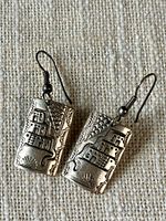 Front view of both sterling silver pueblo motif earrings